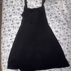 Volcom black midi dress with a tie up back